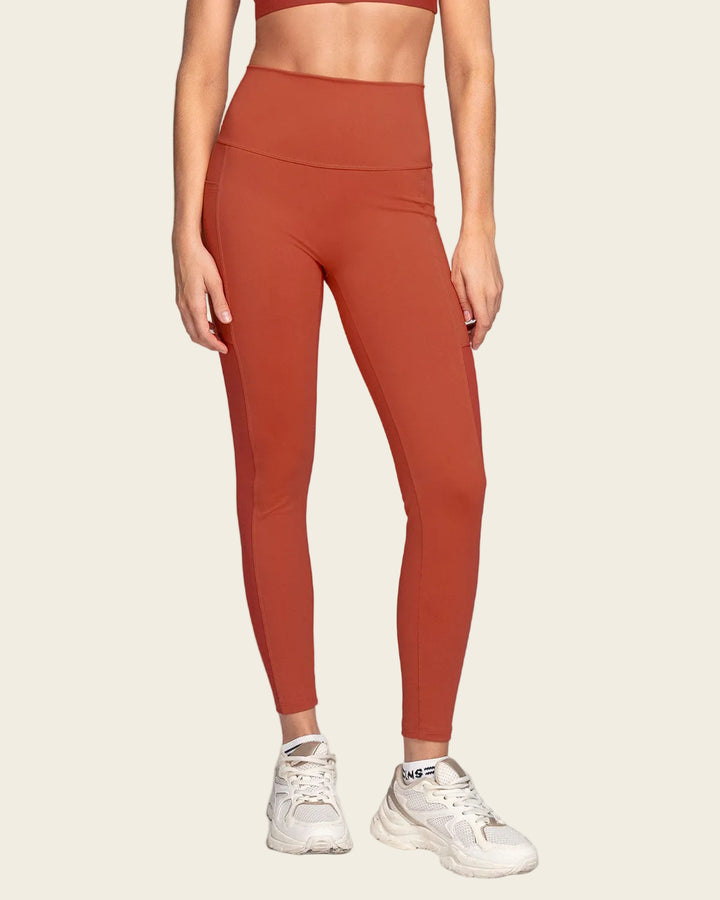 Legging deportivo con bolsillo lateral y detalles en SmartLace®
