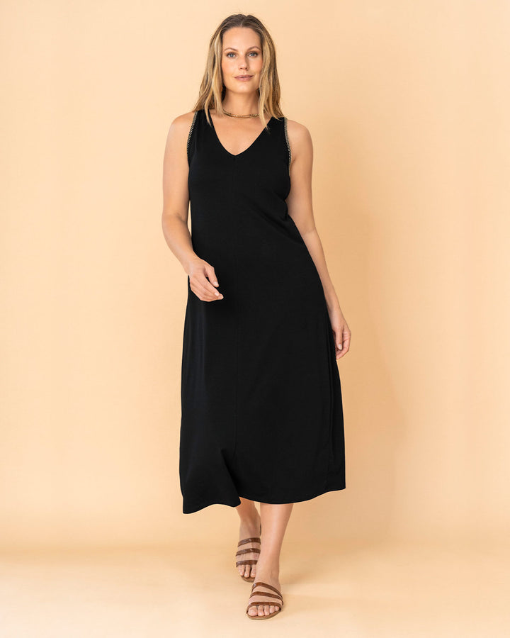 Vestido midi esencial con detalle bordado en sisa