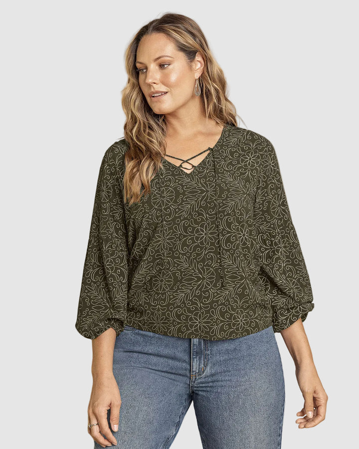 Blusa manga larga con tiras en escote en V