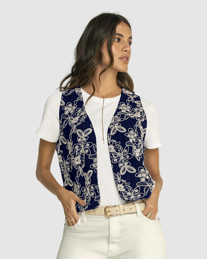 Chaleco manga sisa abierto en tela bordada