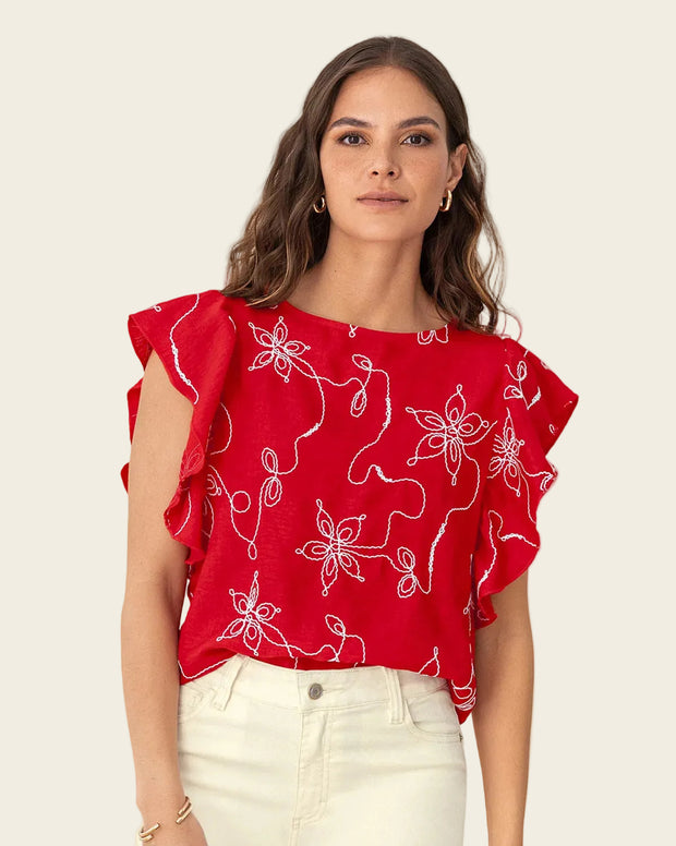 Blusa en tela bordada con bolero en mangas