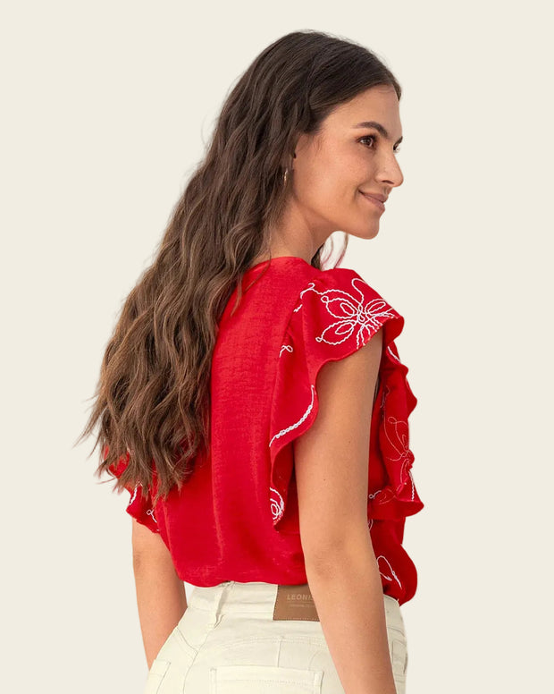 Blusa en tela bordada con bolero en mangas