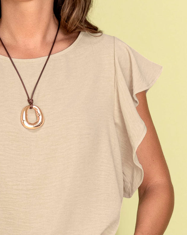 Blusa con boleros en mangas en tela craquelada
