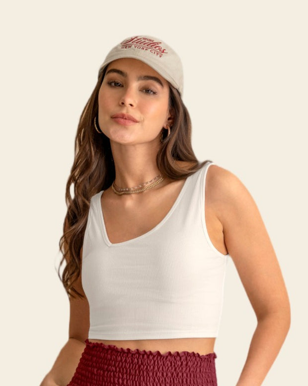 Crop top acanalado con escote asimétrico