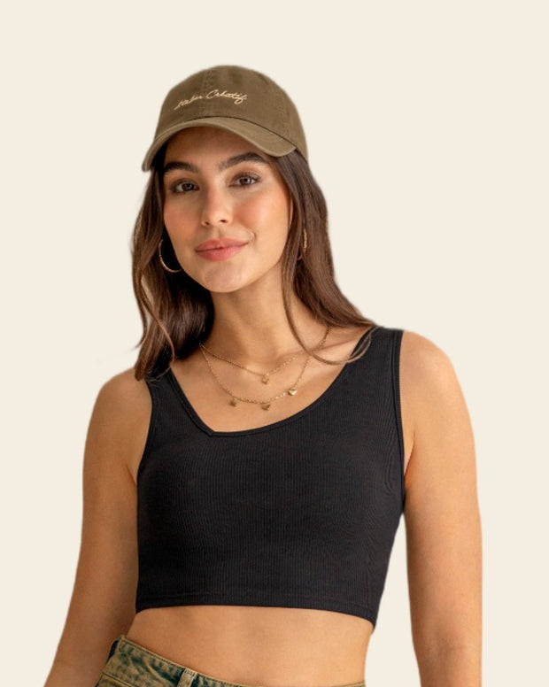 Crop top acanalado con escote asimétrico
