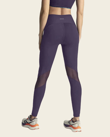 Legging de compresión con mallas transpirables en piernas#color_450-morado