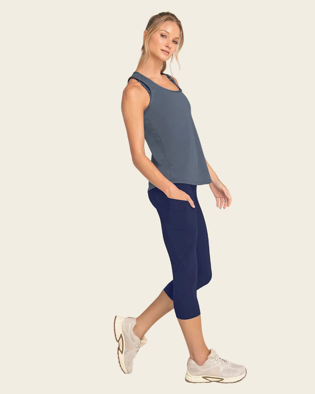 Capri de compresión en abdomen y muslos con bolsillo lateral
