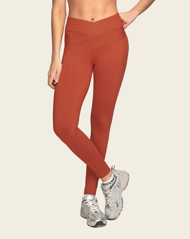 Legging deportivo de compresión con pretina cruzada en forma de V