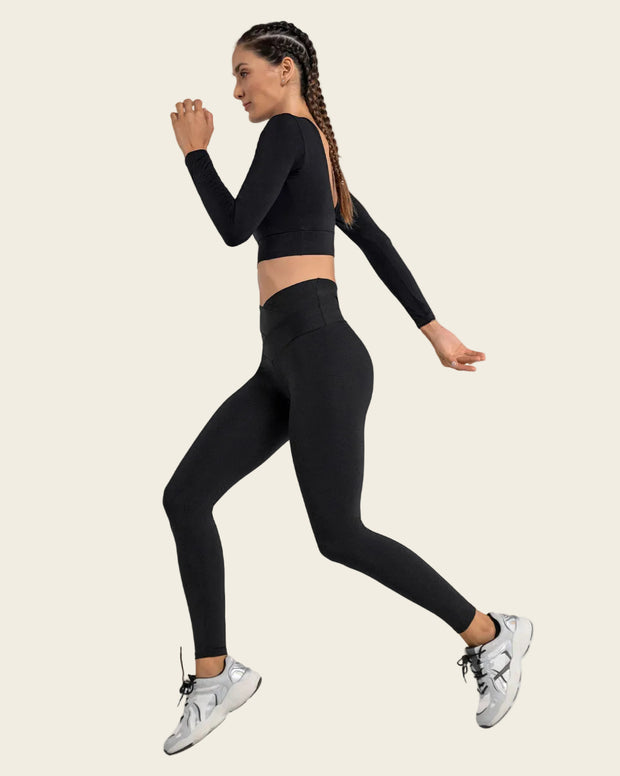 Legging deportivo de compresión con pretina cruzada en forma de V