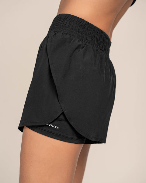 Short deportivo con short ajustado interno#color_700-negro