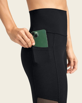 Legging deportivo con bolsillo lateral y detalles en SmartLace®#color_700-negro