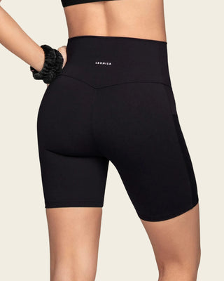 Short ciclista con bolsillo lateral y compresión de abdomen#color_700-negro