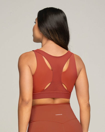Top deportivo espalda atlética con detalles en SmartLace®#color_336-rojo-canela