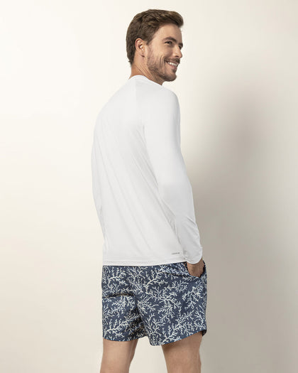 Pantaloneta de baño masculina con práctico bolsillo al lado derecho#color_a03-estampado-corales-azul