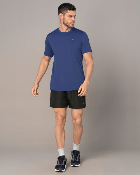 Camiseta deportiva masculina semiajustada de secado rápido#color_522-estampado-camuflado-azul