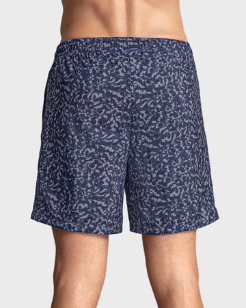 Pantaloneta deportiva con bolsillos funcionales#color_a63-estampado-animal-print