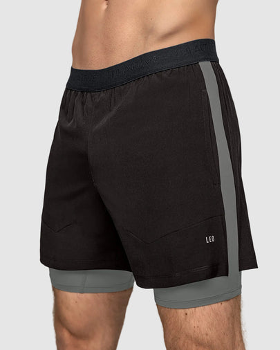 Pantaloneta deportiva con bóxer interno fijo#color_700-negro