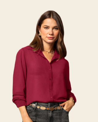 Blusa-manga-larga-elaborada-en-tela-con-transparencia#color_c34-vino