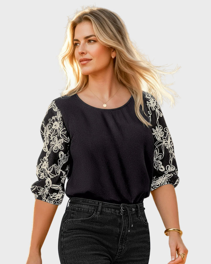 Blusa con mangas en tela bordada