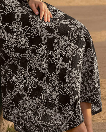 Vestido largo en tela bordada#color_700-negro