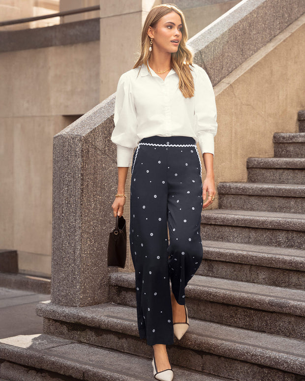 Pantalón bota ancha con detalles en contraste