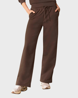 Pantalón bota amplia con elástico y tira anudable en cintura#color_c23-cafe-chocolate