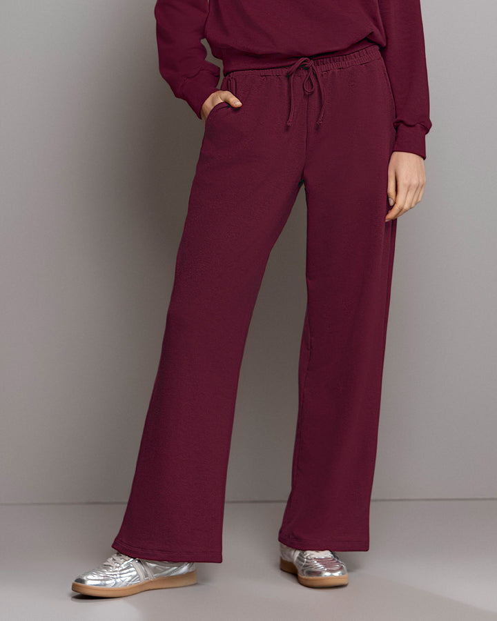 Pantalón bota amplia con elástico y tira anudable en cintura