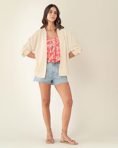 Blusa de tiritas con escote en V y boleros en ruedo#color_104-fondo-coral