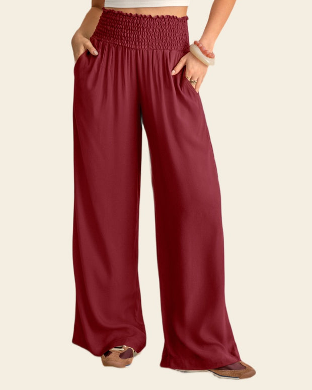 Pantalón bota ancha con nido de abeja en cintura