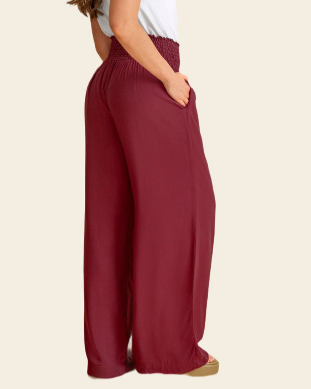 Pantalón bota ancha con nido de abeja en cintura