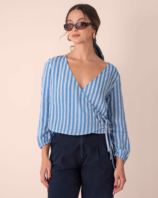 Blusa cruzada de mangas 3/4#color_022-azul-claro
