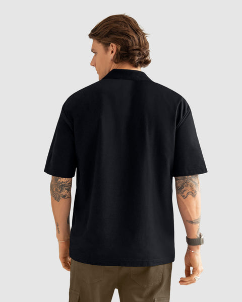 Camiseta tipo polo oversized#color_700-negro